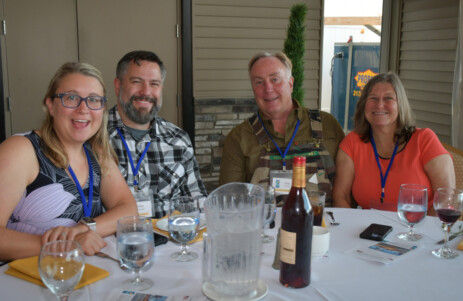 Sampling the food available at the Annual Benefit Dinner
